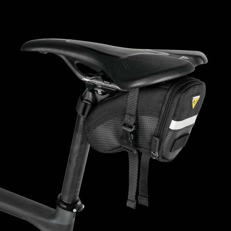 Topeak Aero Wedge Strap Mount bike seat pack with pump holder and reflective strips, bike accessories for secure storage