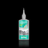 Motorex Hydraulic Fluid 75 mineral oil for bicycle hydraulic brake systems, workshop use, in a clear container.