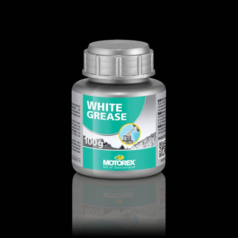 Motorex Workshop White Grease lithium bicycle lubricant applied to bike bearings and cranksets in a workshop setting.