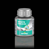 Motorex Workshop White Grease lithium bicycle lubricant applied to bike bearings and cranksets in a workshop setting.