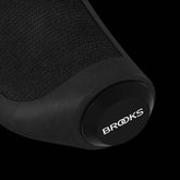 Brooks Cambium ergonomic bike grips in black, 130mm length, designed for comfort and control on bicycle handlebars.