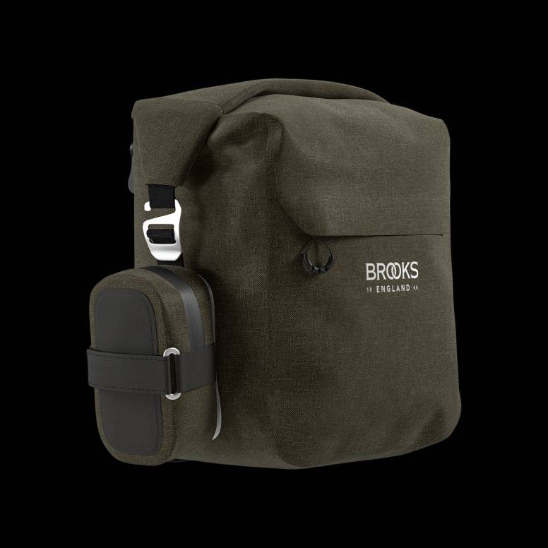 Brooks Scape waterproof pannier with Klick Fix attachment for bike racks, durable cycling accessory in black with brand logo.