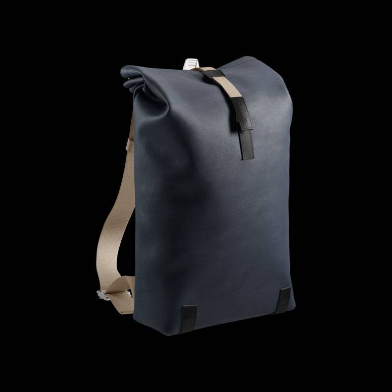 Brooks Pickwick roll-top backpack with laptop sleeve, urban cycling and commuting accessories, black with adjustable straps and front pocket.