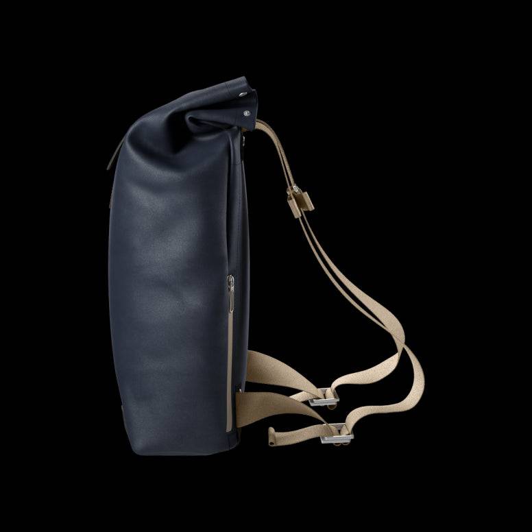 Brooks Pickwick roll-top backpack with laptop sleeve, ideal for urban cycling and commuting, featuring durable fabric and adjustable straps.