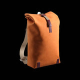 Brooks Pickwick roll-top backpack with laptop sleeve, ideal for urban cycling and commuting, featuring durable accessories and adjustable straps.