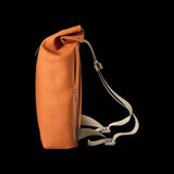 Brooks Pickwick roll-top backpack with laptop sleeve, designed for urban cycling and commuting, featuring durable fabric and adjustable straps.