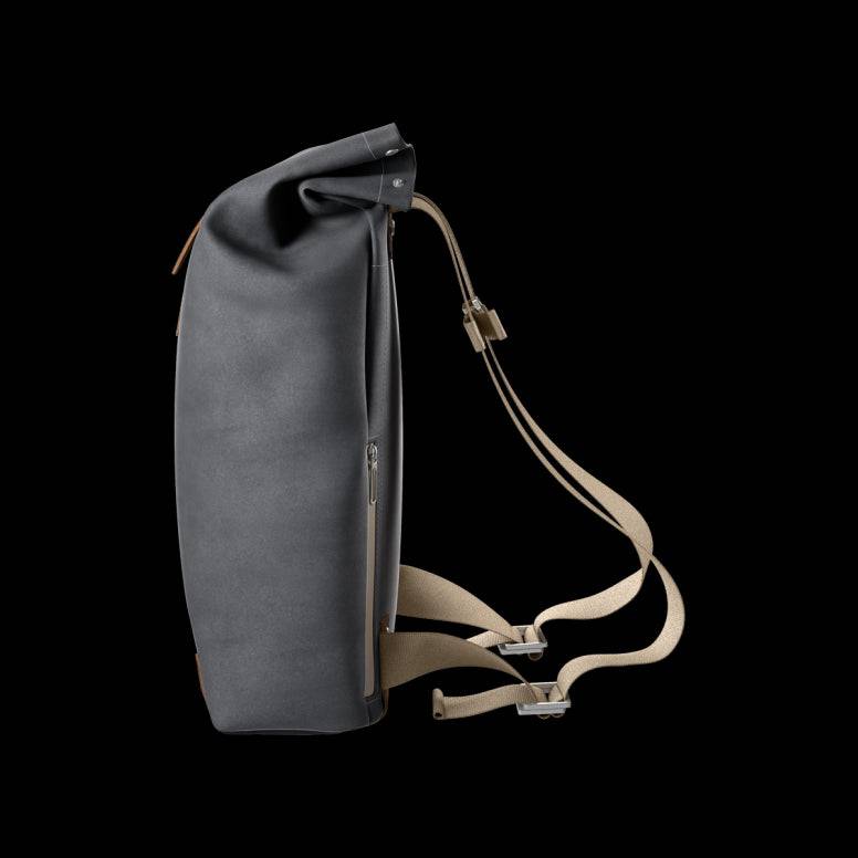 Brooks Pickwick roll-top backpack with laptop sleeve, ideal for urban cycling and commuting, featuring durable accessories and modern design.