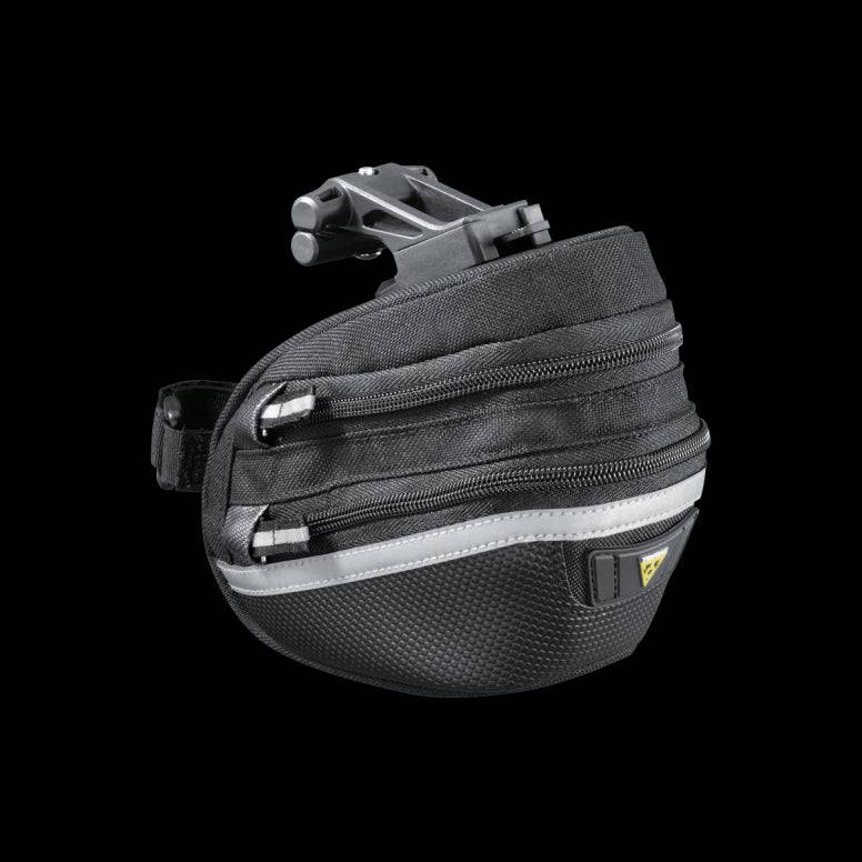 Topeak Wedge II Black Micro Bike Seat Pack with quick release mount and reflective strips attached to bike seat.