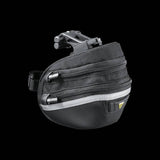 Topeak Wedge II Black Micro Bike Seat Pack with quick release mount and reflective strips attached to bike seat.