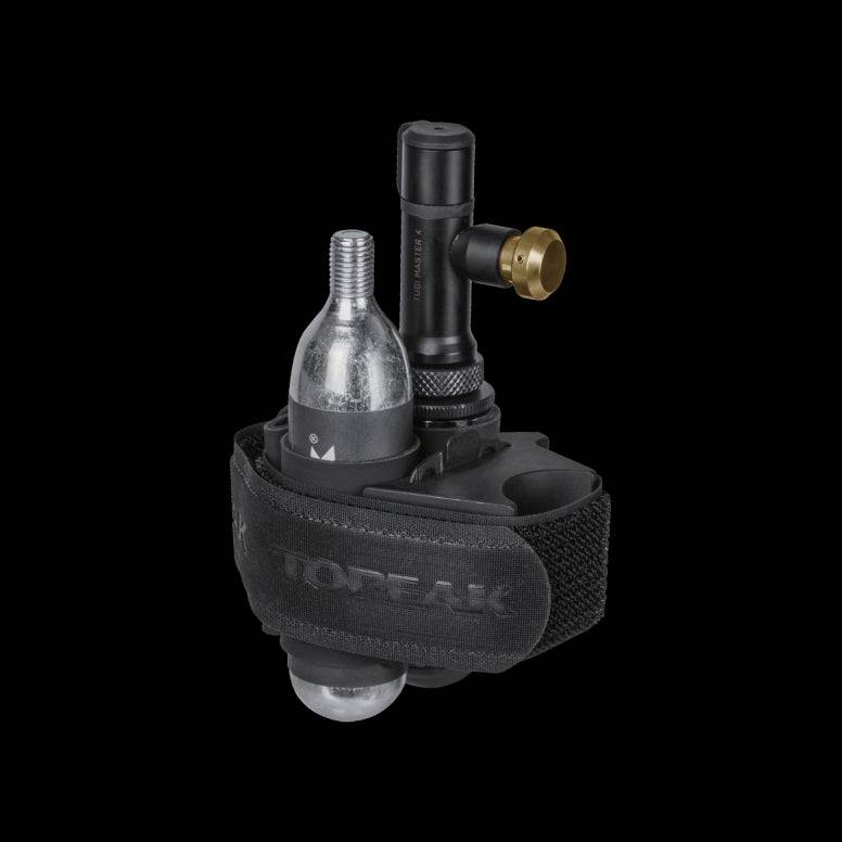 Topeak Tubi Master X 2-in-1 tubeless tyre repair and CO2 inflator kit, workshop tool with repair tools and inflator components.