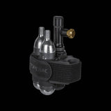Topeak Tubi Master X 2-in-1 tubeless tyre repair and CO2 inflator kit for bike workshop use, featuring repair tools and inflator.