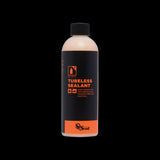 Orange Seal tubeless sealant refill for bike tires, providing puncture protection and sealing leaks in tubeless bicycle setups.