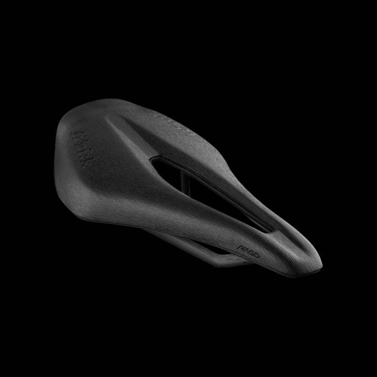 Fizik Vento Argo 00 racing saddle with ergonomic cut-out and carbon rails, designed for high-performance cycling components.