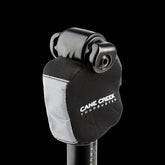 Cane Creek Thudglove suspension cover made of black neoprene, designed to protect parallelogram spare components and accessories.