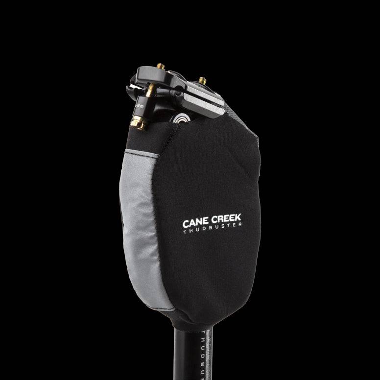 Cane Creek Thudglove suspension cover made of black neoprene, designed to protect parallelogram spares and accessories.
