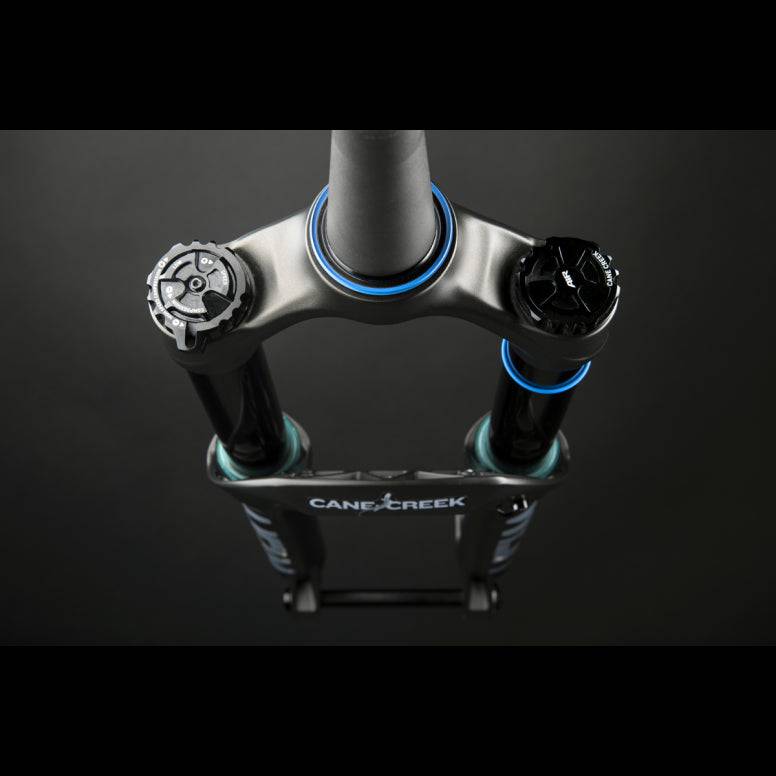 Cane Creek Helm MKII Coil fork for mountain bikes with adjustable travel 130-160mm, featuring coil suspension and sleek design