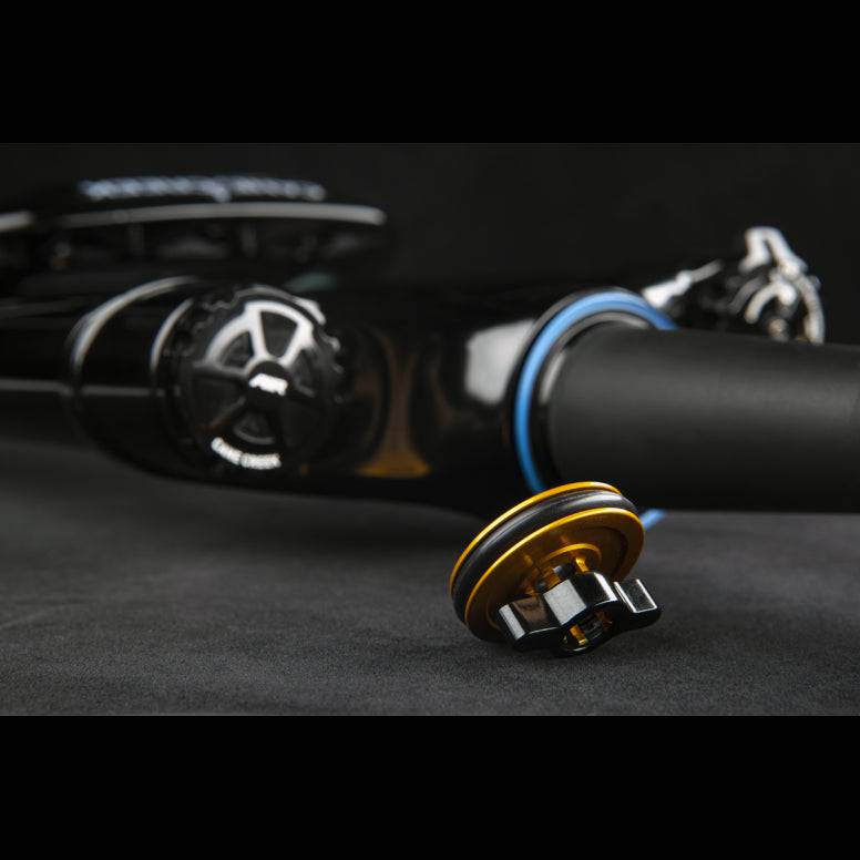 Cane Creek Helm MKII Coil fork for mountain bikes with adjustable travel 130-160mm, showing the suspension and coil spring.