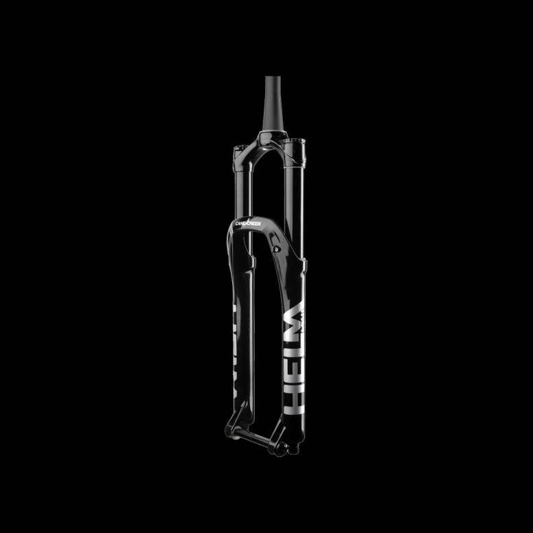 Cane Creek Helm MKII Coil mountain bike fork with adjustable travel 130-160mm, showing the coil suspension and sleek black design.