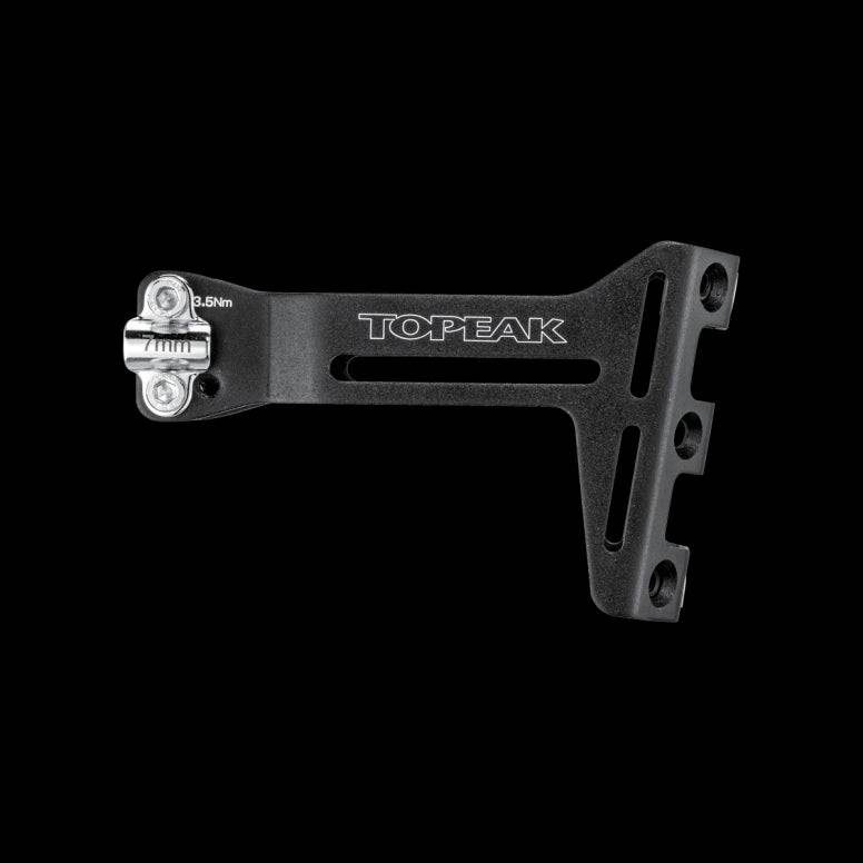 Topeak Tri-Backup Pro adjustable bottle cage mount attached to a bike saddle for hydration storage and accessories.