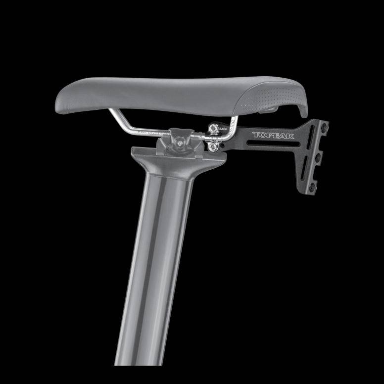 Topeak Tri-Backup Pro adjustable bottle cage mount for bikes, saddle attachment with hydration storage options.