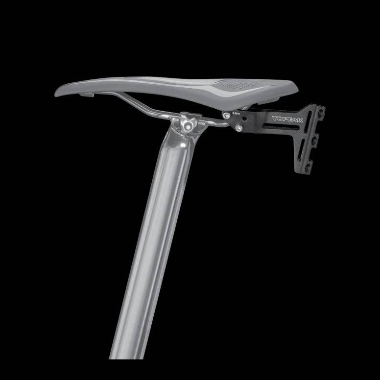 Topeak Tri-Backup Pro adjustable bike saddle bottle cage mount for hydration storage and accessories.