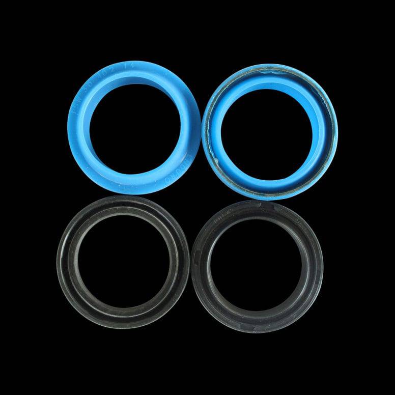 Enduro Bearings fork seals kit for Marzocchi forks, durable high-performance replacement components, close-up of seals and packaging.