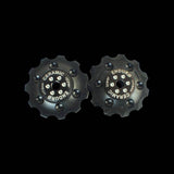 Enduro Bearings Zero Ceramic Jockey Wheels for Shimano, SRAM, Campagnolo drivetrain components, with black ceramic rollers and metal frame.