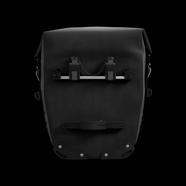 Brooks Scape waterproof pannier with Klick Fix attachment for bike racks, showing durable outdoor gear for cycling accessories.