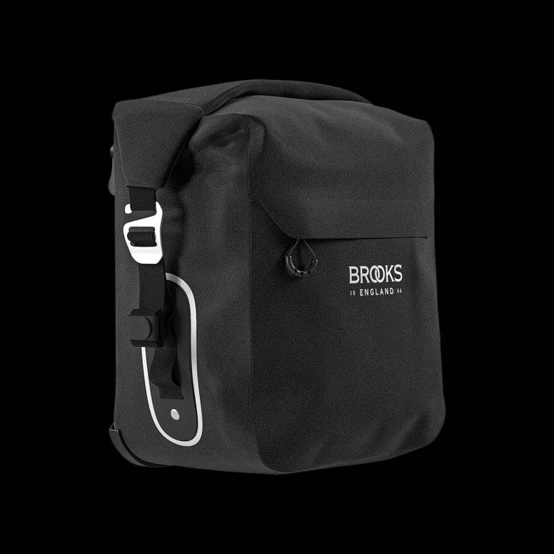 Brooks Scape waterproof pannier with Klick Fix attachment for bike racks, designed for durable bike gear storage.