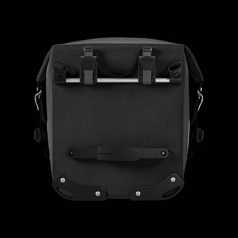 Brooks Scape waterproof bike pannier with Klick Fix attachment mounted on a bike rack, designed for cycling accessories.