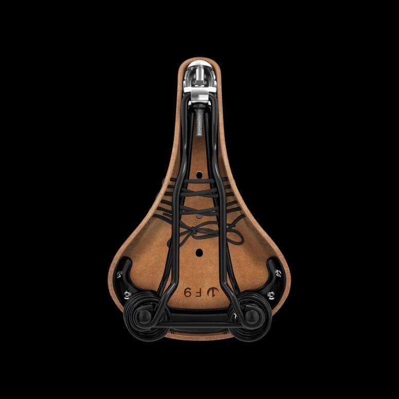 Brooks Flyer softened tan leather bike saddle with steel rails, 175mm, unisex touring bicycle component.