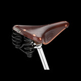 Brooks Flyer Special saddle for long-distance cycling, featuring durable support and comfortable design for road biking.