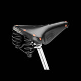 Brooks Flyer Special saddle for long-distance cycling, featuring durable support and comfortable design for cycling components.