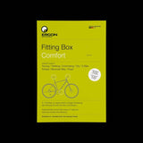 Ergon Fitting Box bike adjustment kit with components for saddle, handlebar, and pedal comfort, including various tools and parts.