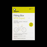 Ergon fitting box bike adjustment kit with saddle, handlebar, and pedal components for improved cycling comfort.