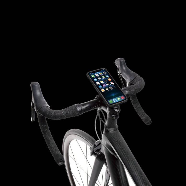Topeak Ridecase for iPhone 13 Mini, a protective bike phone mount with adjustable viewing angle on a bicycle handlebar.