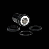 Cane Creek Double Barrel damper mounting hardware for rear shock, including components and accessories in black.