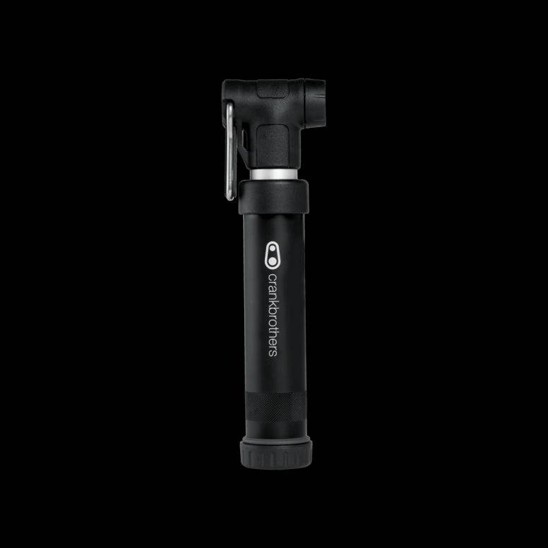 Crank Brothers Gem Short Hand Pump with dual Presta and Schrader valves, compact bike pump accessory for inflating tires.