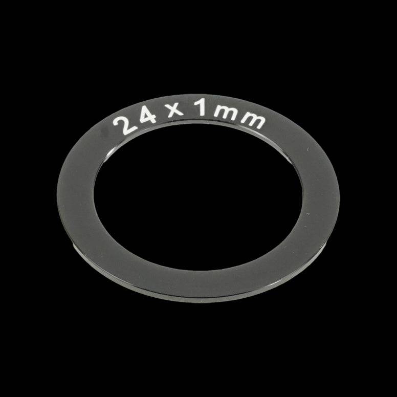 Enduro Bearings aluminium spacers for bottom bracket axle, bike components, lightweight and durable for bike maintenance.