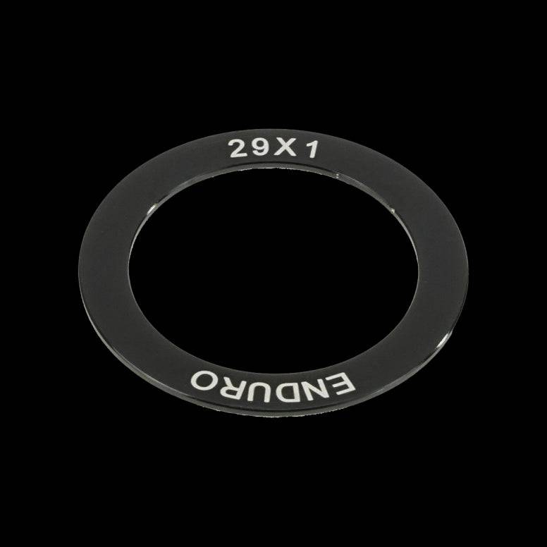 Enduro Bearings spacer for DUB cranks and bottom brackets, showing a metal component for bike drivetrain assembly.