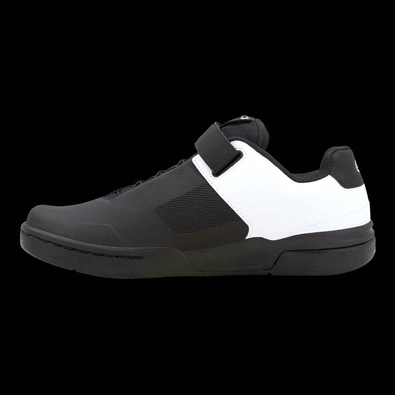 Crank Brothers Stamp Speedlace MTB shoes in black with flat pedal design, featuring breathable upper and secure lacing for mountain biking.