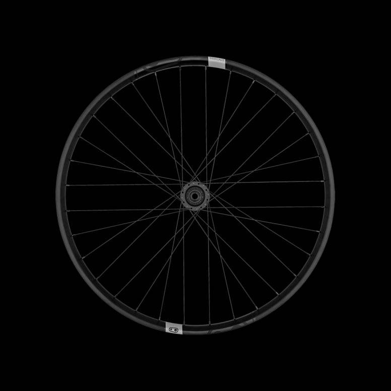 Crank Brothers Synthesis Alloy Enduro Rear Wheel with CB hub mounted on a mountain bike for off-road riding.