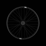 Crank Brothers Synthesis Alloy Enduro Rear Wheel with CB hub mounted on a mountain bike for off-road riding.