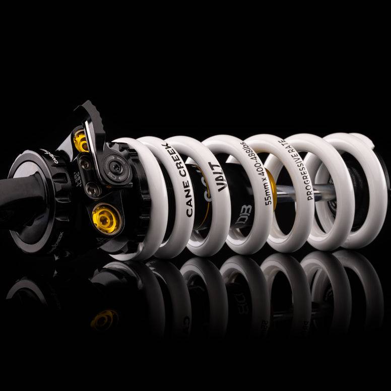 Cane Creek DBcoil IL G2 rear shock with four-way adjustability and climb switch for mountain bike suspension.
