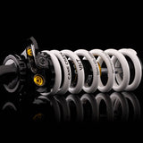 Cane Creek DBcoil IL G2 rear shock with four-way adjustability and climb switch for mountain bike suspension.