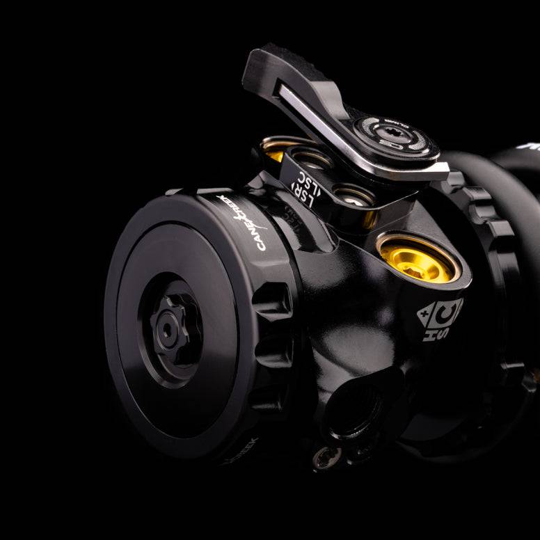 Cane Creek DBcoil IL G2 trunnion rear shock with 4-way damping and climb switch for mountain bike suspension.
