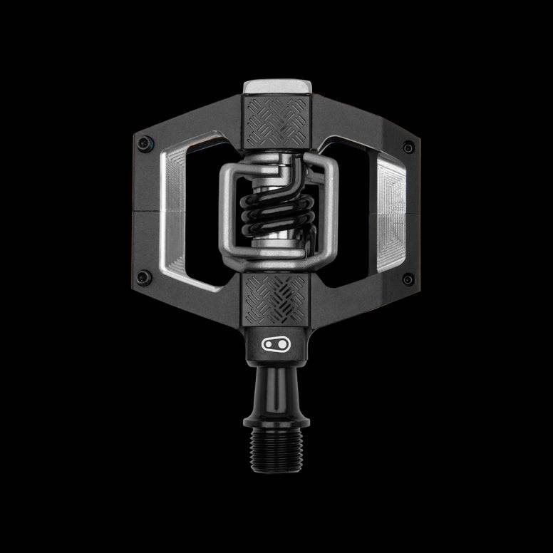 Crank Brothers Mallet Trail clipless pedals for trail and gravel biking, showing their durable design and cleat interface.