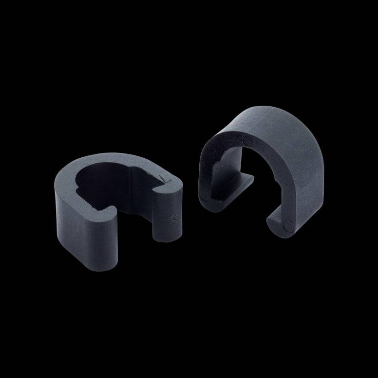 Jagwire C-Clip housing guides for bike frame, cable housing clips, and accessories, shown mounted on a bike frame.