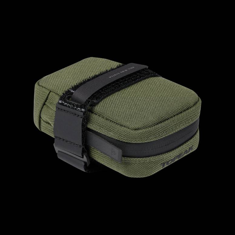 Topeak Elementa seatbag attached to a bike saddle, compact bike saddle bag for tools and inner tubes, black and durable design
