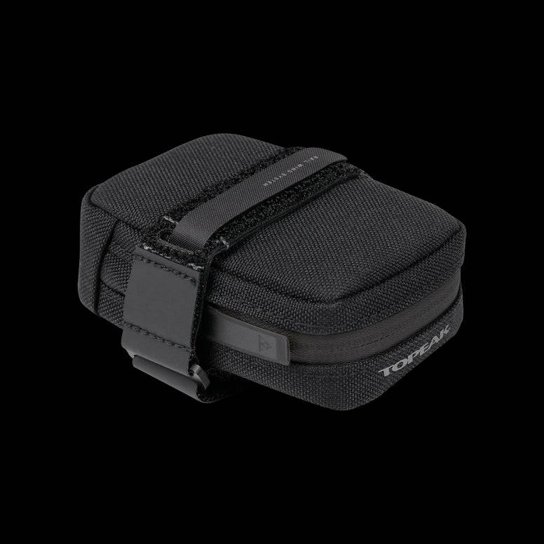Topeak Elementa seatbag compact bike saddle bag with tools and inner tubes, mounted on a bike saddle for cycling accessories.